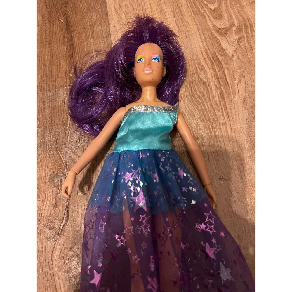 Vintage 1985 Hasbro Jem and the Holograms Doll Purple Hair Star Dress 80s Toy‎